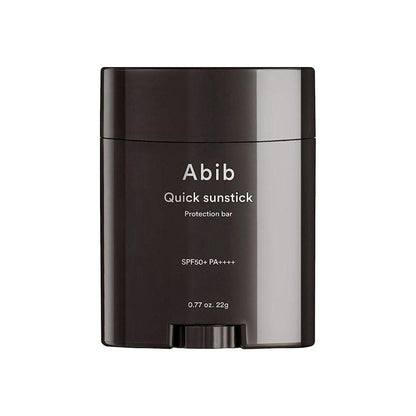 The Abib Quick Sunstick Protection Bar SPF50+ PA++++ (22g) is a Korean sunscreen stick that enhances skin barrier strength. It features sleek packaging with white text on a black background, combining functionality and style.
