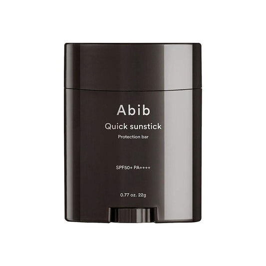 The Abib Quick Sunstick Protection Bar SPF50+ PA++++ (22g) is a Korean sunscreen stick that enhances skin barrier strength. It features sleek packaging with white text on a black background, combining functionality and style.