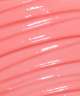 A close-up of the glossy, pink ridges of the LANEIGE Lip Sleeping Mask - BERRY 20g reveals a repeating pattern that mirrors a nourishing lip balm, with a sleek wavy texture that reflects light to highlight its smoothness and curvature.