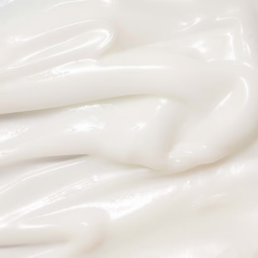 Close-up of Beauty of Joseons Dynasty Creams smooth, creamy texture with gentle folds and a shiny finish, resembling lotion—perfect for achieving a glass-like complexion with its silky touch.