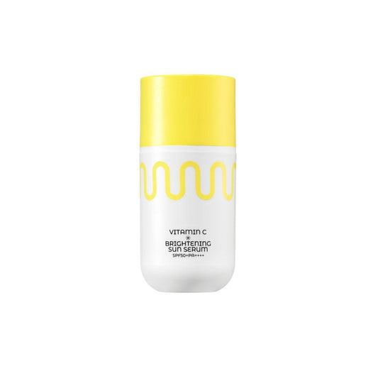 COMMONLABS Vitamin C Brightening Sun Serum SPF 50+ PA++++ in a white and yellow bottle. A lightweight sunscreen with vitamin C for UV protection and skin brightening.