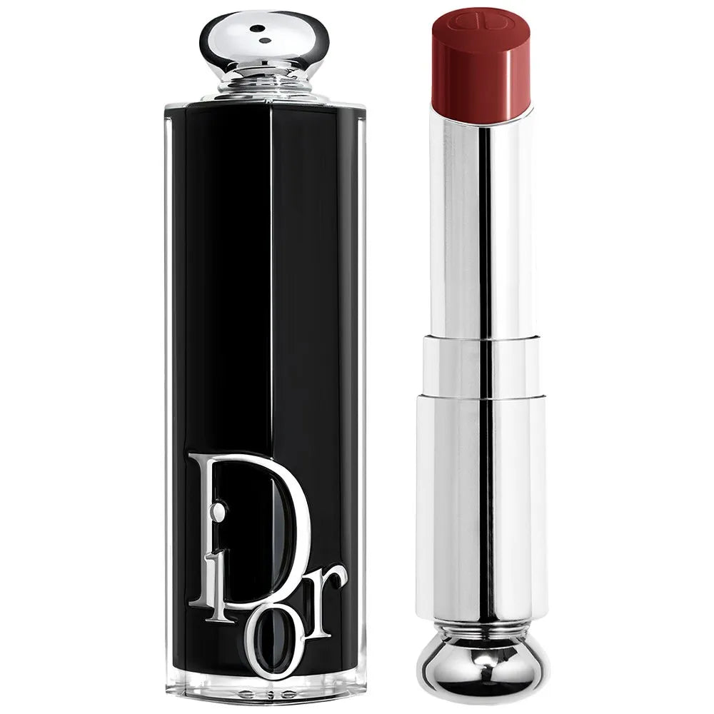 Dior lipstick with black case and silver cap on a white background
