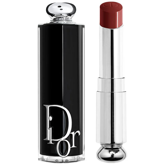 Dior lipstick with black case and silver cap on a white background