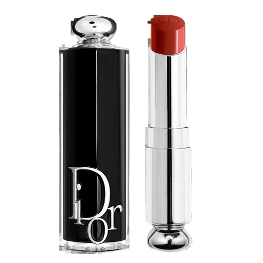 Dior lipstick and case on a white background