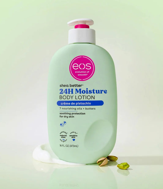 Green bottle of eos body lotion with pistachio flavor on a light green background