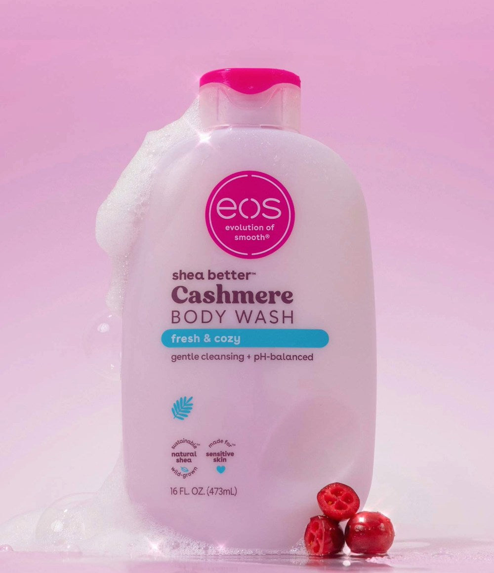 eos shea butter cashmere body wash bottle on a pink background