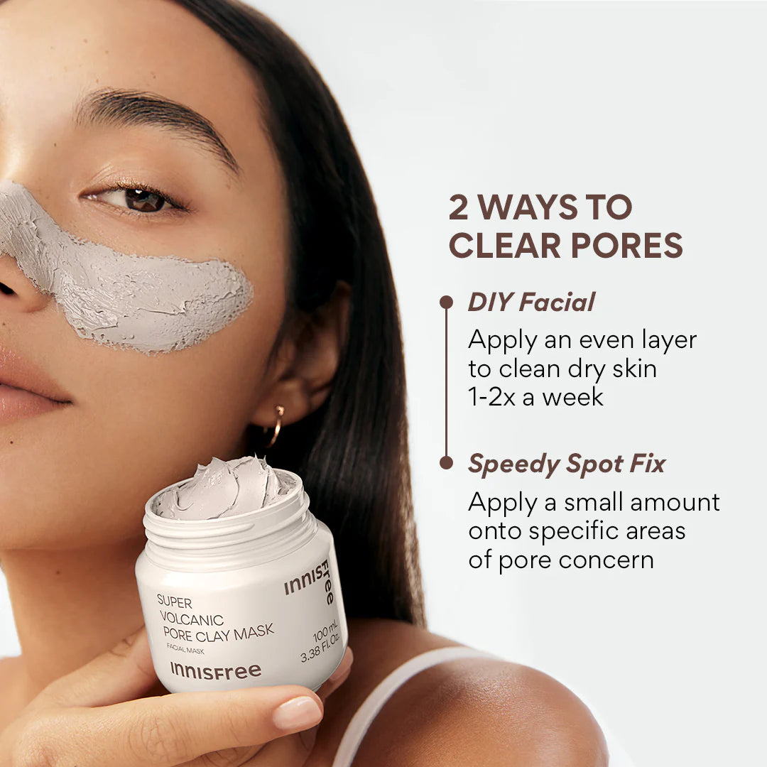 An individual applies the INNISFREE Super Volcanic Pore Clay Mask 100ml to their cheek. The text reads: 2 Ways to Clear Pores: Use DIY Facial 1-2x weekly for sebum control and blackhead removal, or try Speedy Spot Fix on problem areas.