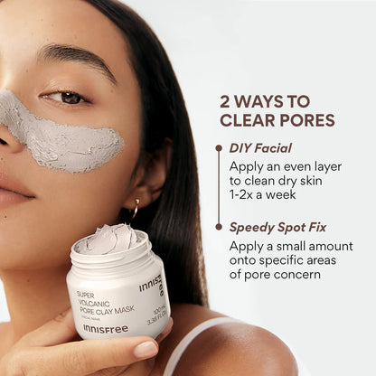 An individual applies the INNISFREE Super Volcanic Pore Clay Mask 100ml to their cheek. The text reads: 2 Ways to Clear Pores: Use DIY Facial 1-2x weekly for sebum control and blackhead removal, or try Speedy Spot Fix on problem areas.