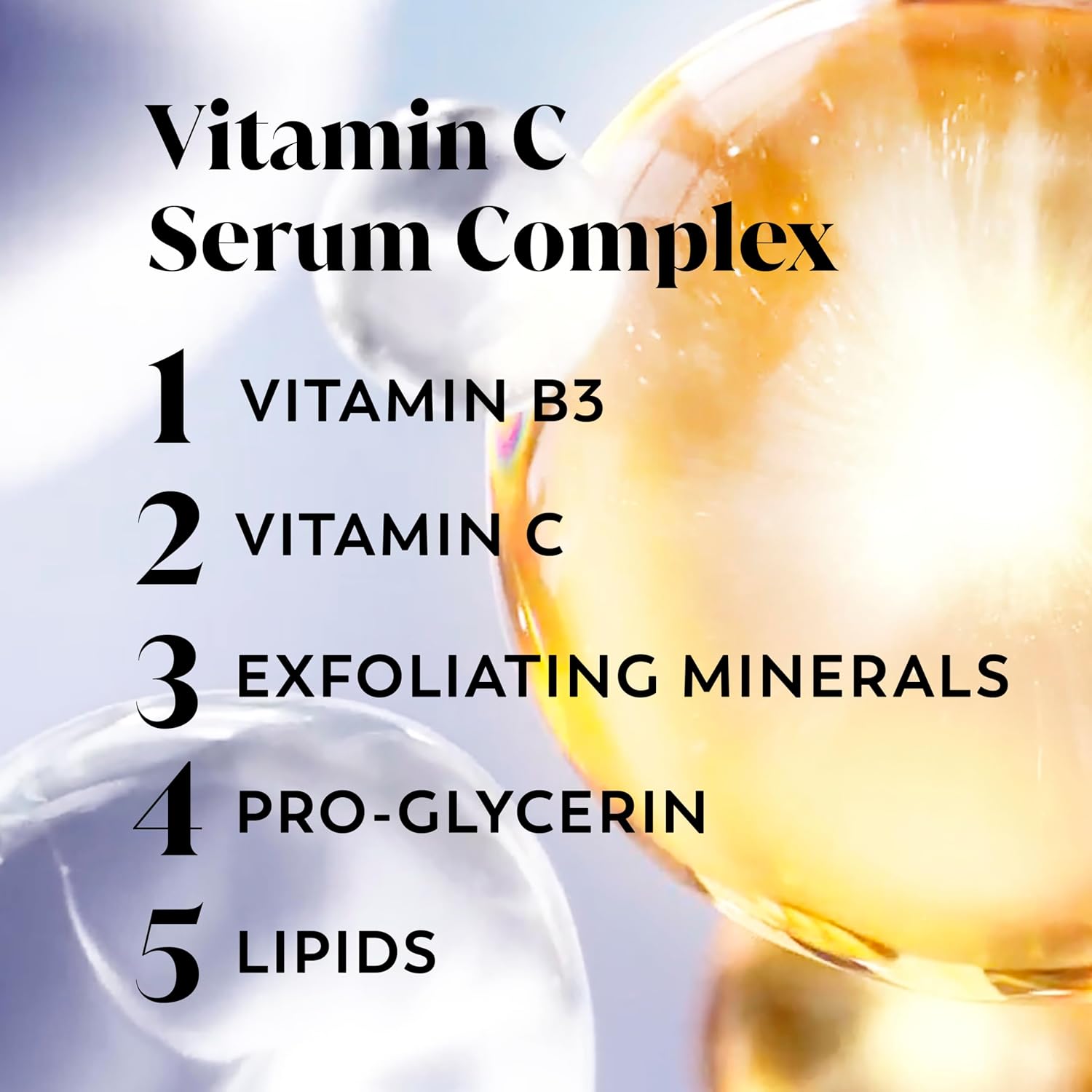 Close-up of translucent drops with text highlighting key ingredients in OLAY Vitamin C Body Wash - Tone Brightening, Vitamin C Serum Complex: Vitamin B3, Vitamin C, Exfoliating Minerals, Pro-Glycerin, and Lipids.