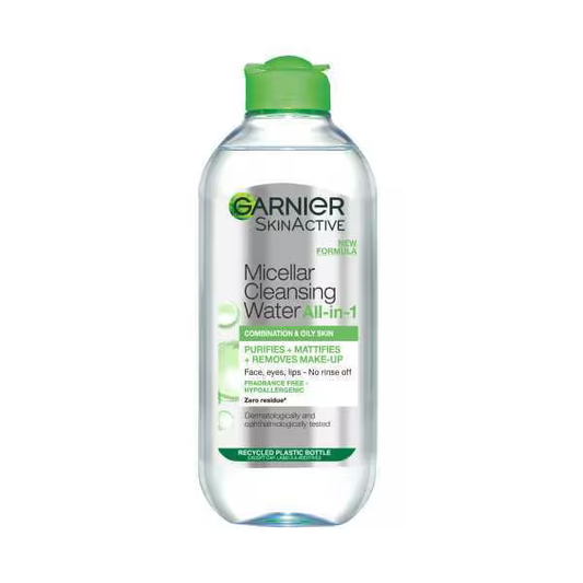 Garnier Micellar Cleansing Water, Makeup Remover for Combination & Oily Skin, is a facial cleanser and makeup remover. The clear bottle with a green cap displays product details and usage instructions on its label.