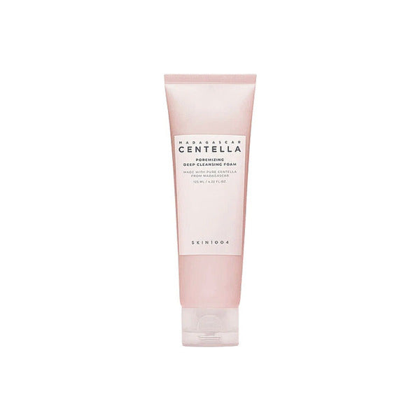 A pink tube of SKIN1004 Madagascar Centella Poremizing Deep Cleansing Foam, enriched with Himalayan Pink salt, stands against a white background, featuring minimalist packaging with the product name and details elegantly displayed in black text.