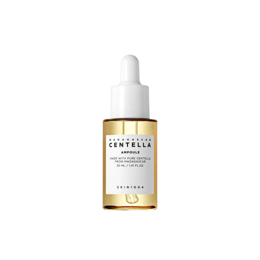 SKIN1004 Madagascar Centella Ampoule with 100% Centella Asiatica extract. Soothes sensitive skin, reduces redness, and strengthens the skin barrier. Lightweight, non-sticky formula.
